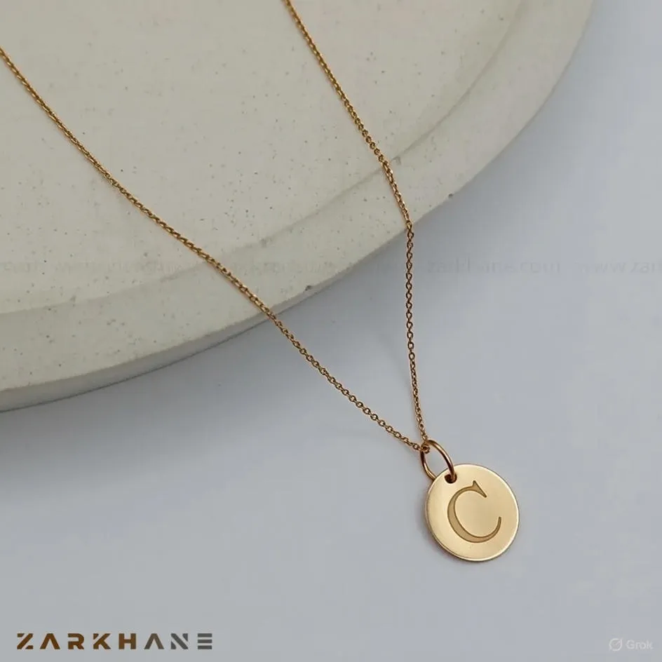 12ae9c96-718a-4903-ad4a-8b5952bfdb9f پلاک طلا حرف C