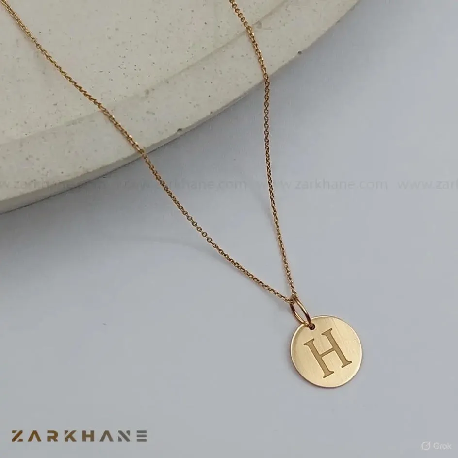 9f31f261-ab5d-40c3-8cb7-58a80e61f16e پلاک طلا حرف H
