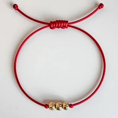 دستبند نخ قرمز سرنوشت با گوی طلا ترند 2025